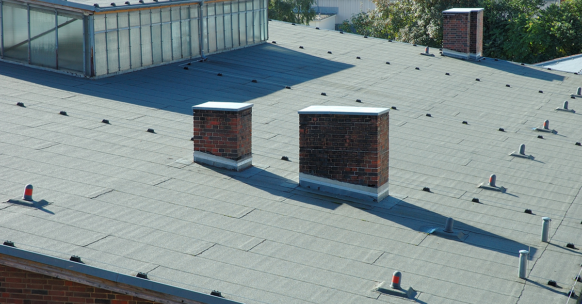 Top 4 Common Flat Roof Problems Aderhold Roofing